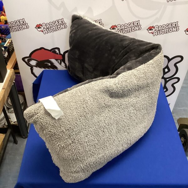 Large grey Costco bench cushion for comfortable outdoor seating.