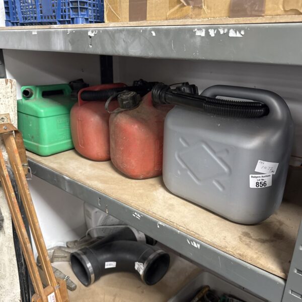 Lot of four plastic jerry cans for storage and transport.