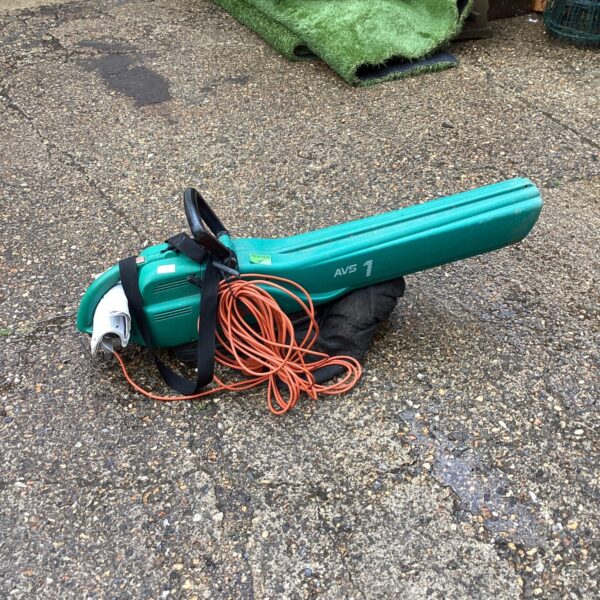 Used AVS lawn vacuum blower with orange power cable.
