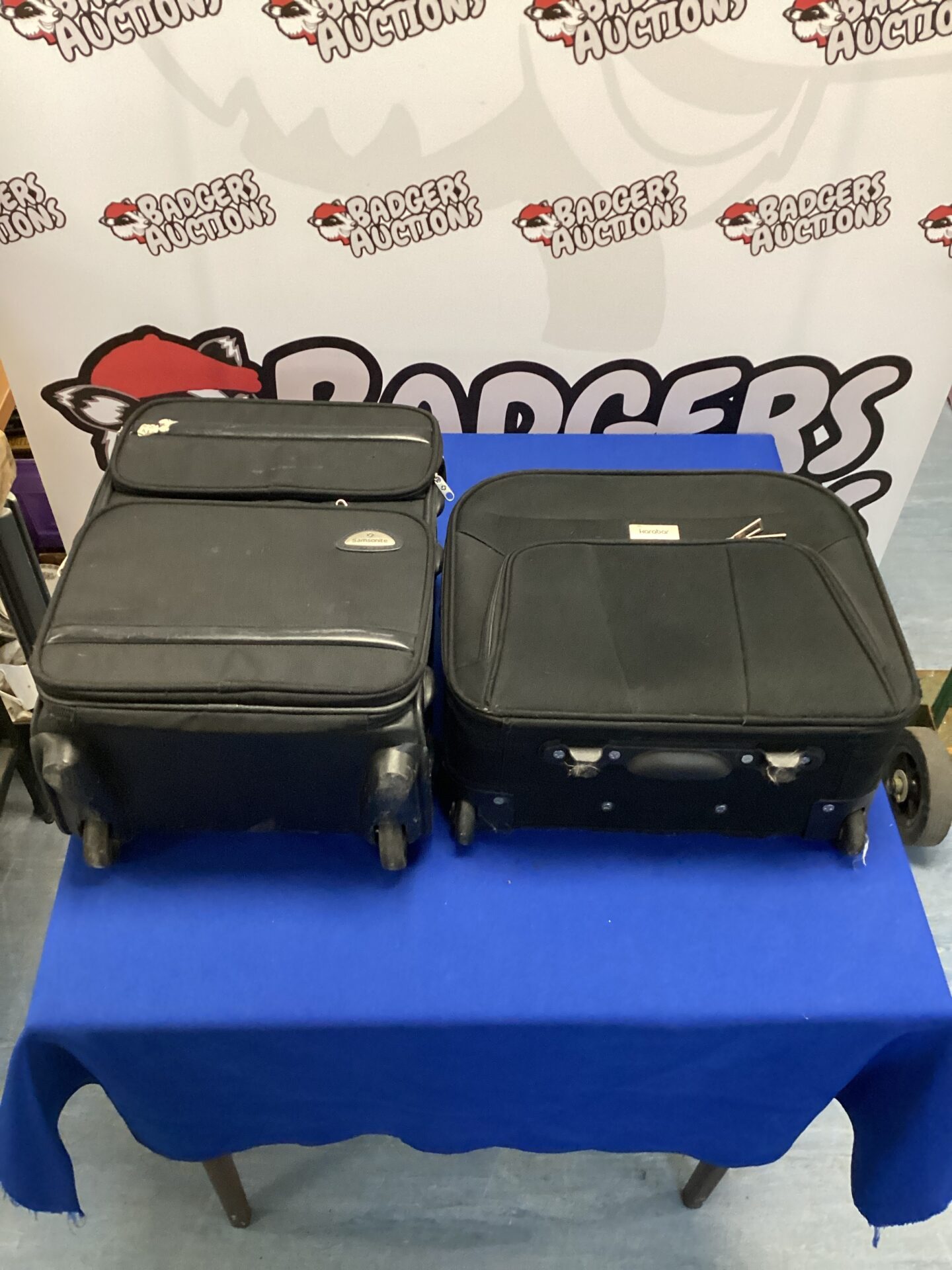 501 Small Karabar wheeled travel case & wheeled samsonite travel case both with extending handles