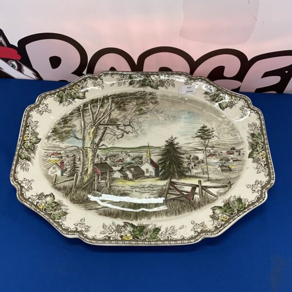 Vintage Johnson Bros serving plate with The Family Village pattern.