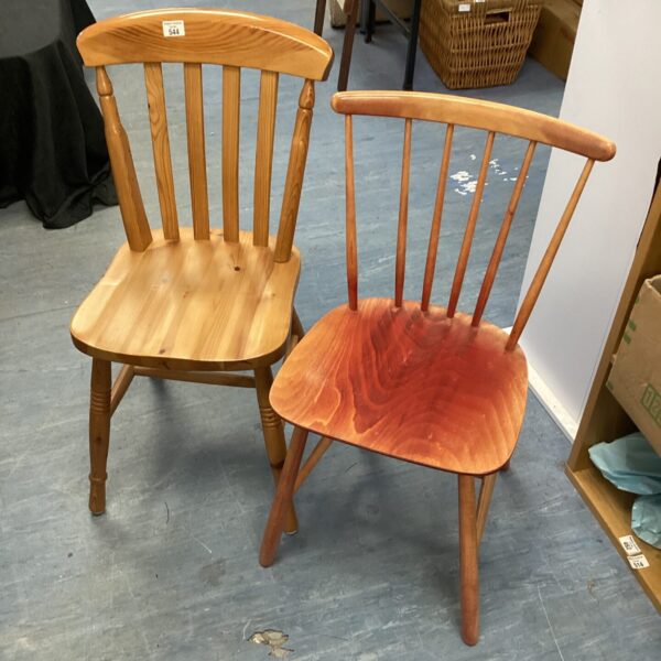 Vintage pine dining chair with spindle back, rustic farmhouse style.