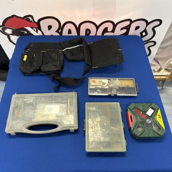 Tool and hardware lot including a Stanley workers belt and drill bits.