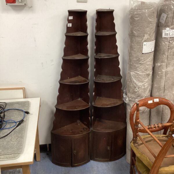 Pair of vintage mahogany corner units for storage and display.