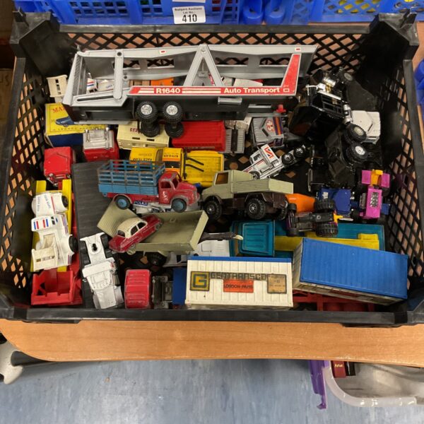 Crate of vintage diecast toy cars including Dinky and Matchbox.