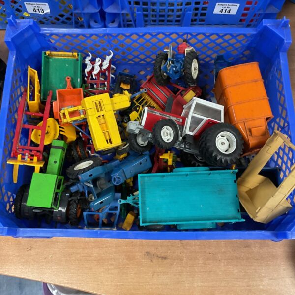 Vintage Britains farm toys and tractors in a tray.