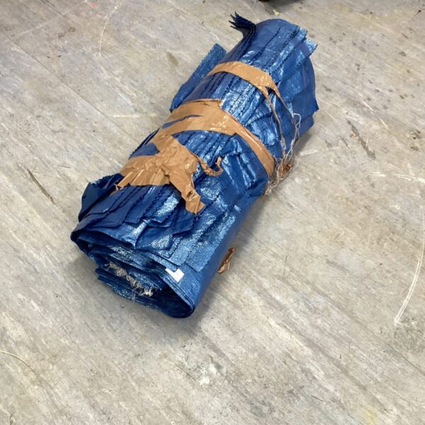 Roll of heavy-duty garden waste bags for garden tidy.