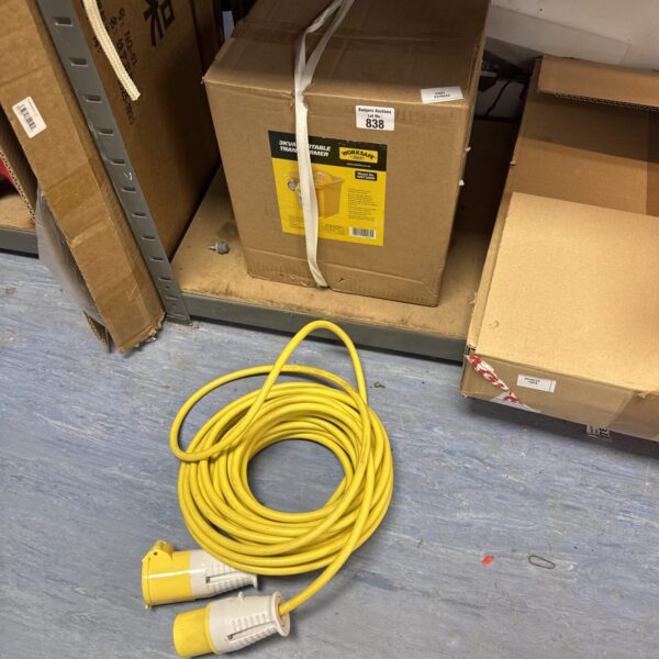Yellow Sealey 110v transformer block with extension lead.