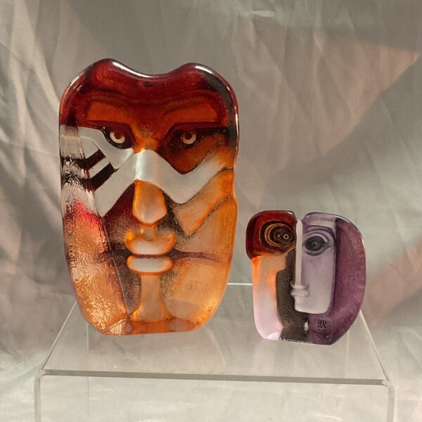 Mats Jonasson crystal sculpture pair, abstract face designs.