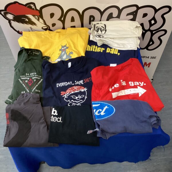 Lot of vintage novelty t-shirts with provocative designs.