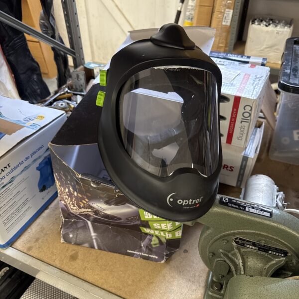 Front view of an Optrel auto-darkening welding mask.