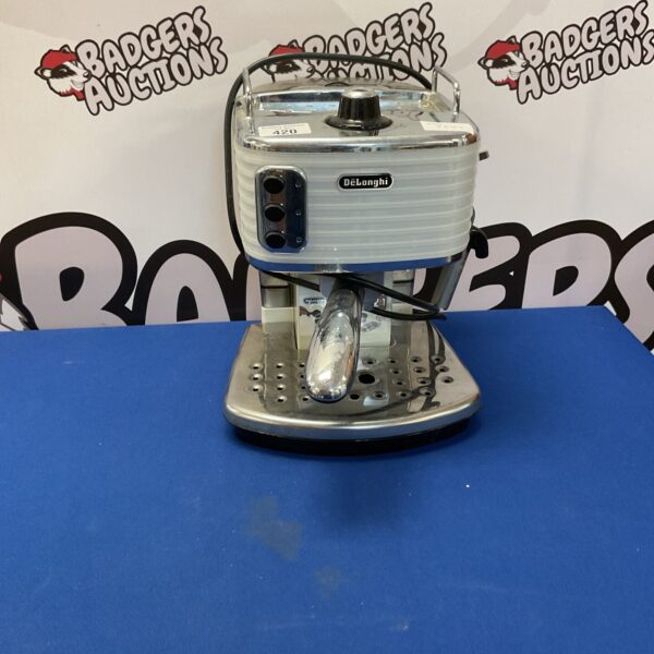 Front view of a stainless steel Delonghi coffee machine.