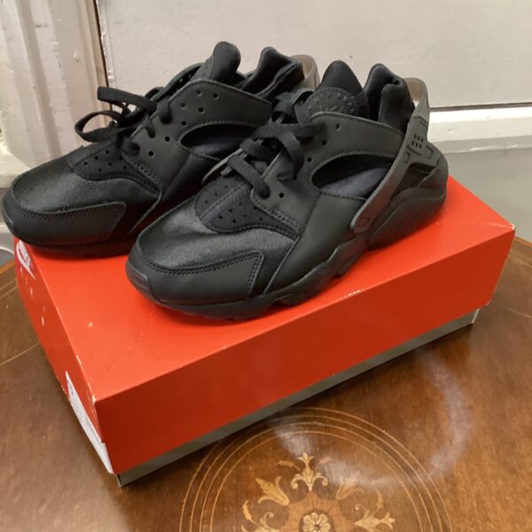 Nike Air Huarache size 4.5 trainers, side view.