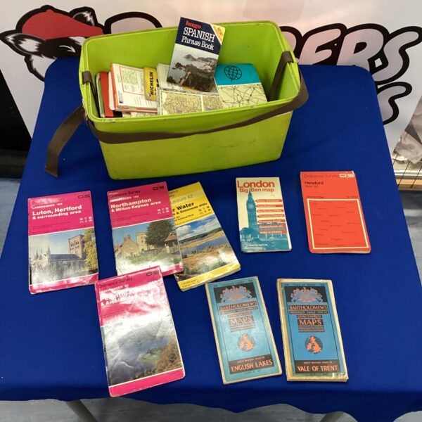 Vintage Ordnance Survey maps in a box, a collection of UK topographical maps.