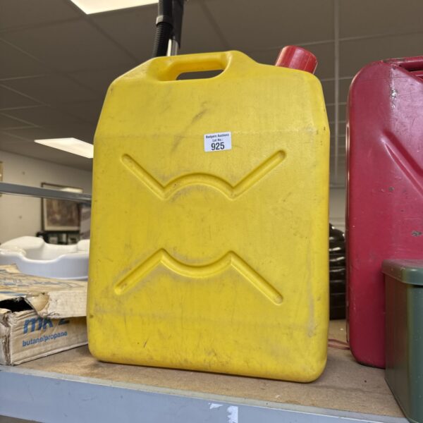 Bright yellow plastic jerry can for fuel or liquid storage.