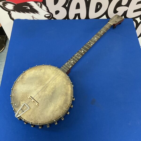 Front view of a vintage five-string banjo.