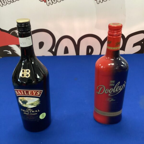 Vintage Baileys Irish Cream and Dooley’s Toffee liqueur bottles for collectors.