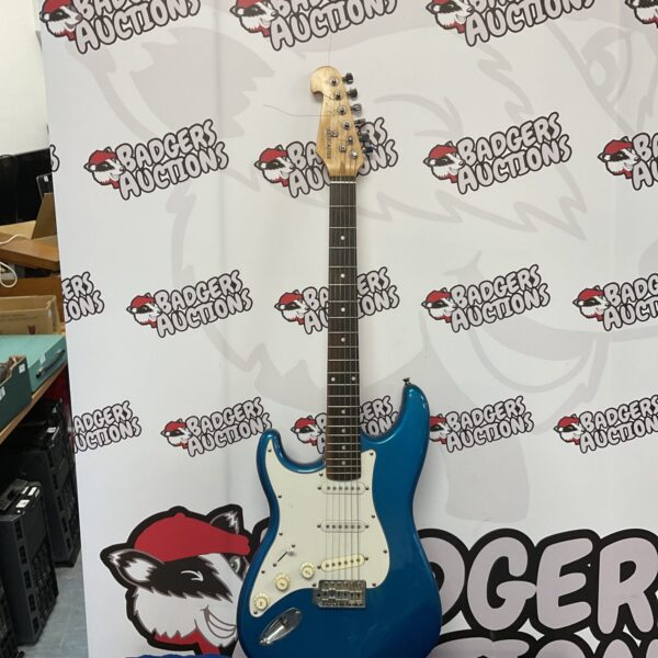 Blue Fender Stratocaster electric guitar, front view.