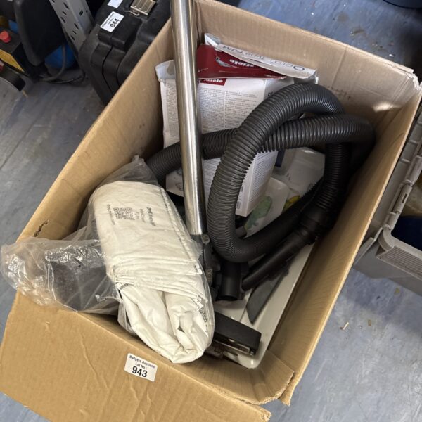 Mixed lot of Miele hoover bags and cleaning accessories.