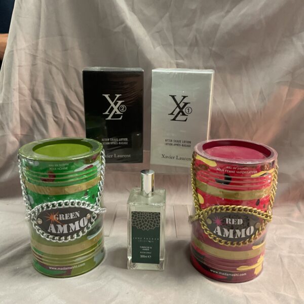 Vintage Jane Packer Ammo perfume set in red and green tins.