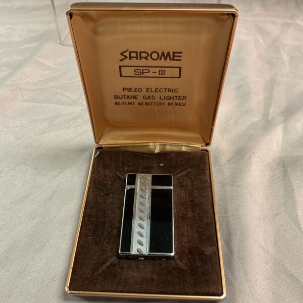 Vintage Sarome SP-III electric lighter in original case.