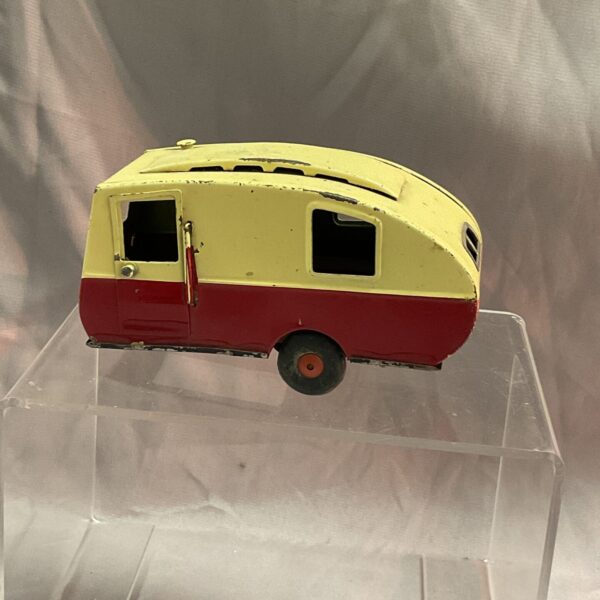 Vintage Triang Minic tinplate caravan, side view.