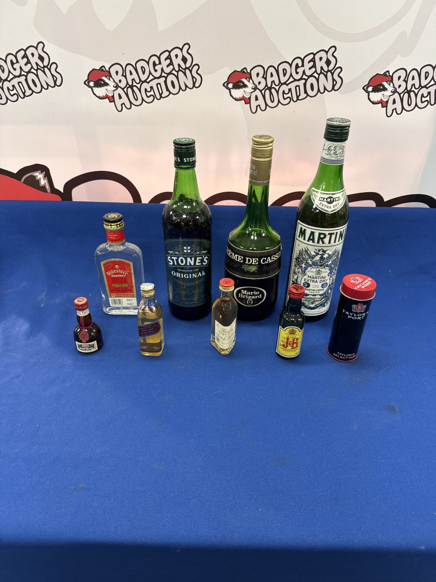 843 Selection of bottles of alcohol inc martini & others