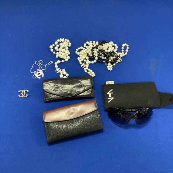 Mulberry glasses case with Chanel style pearl necklace and jewellery.