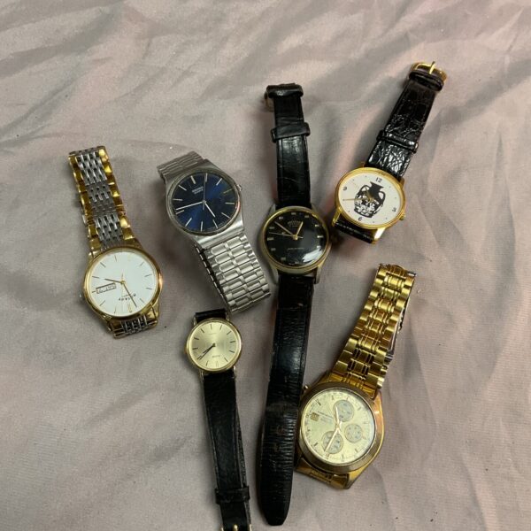 Tray of six analogue wristwatches including Rotary and Citizen.