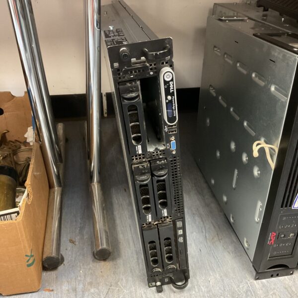 Dell PowerEdge 2970 rackmount server with hard drives installed.