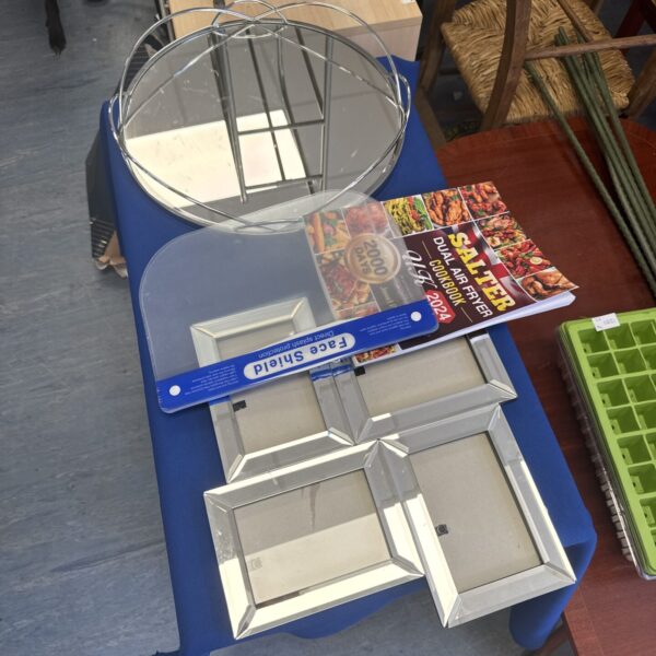 Mixed lot assortment including serving tray, cookery book and face masks.