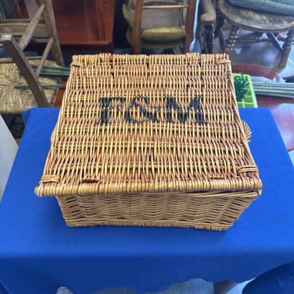 Vintage style wicker basket, approximately 15 inches wide, ideal for storage.