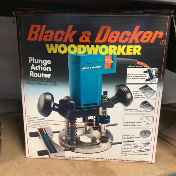 Vintage Black & Decker Woodworker router with attachments.