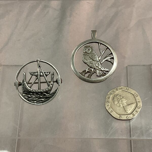 Vintage silver owl pendant and ship brooch set, collectible jewellery.