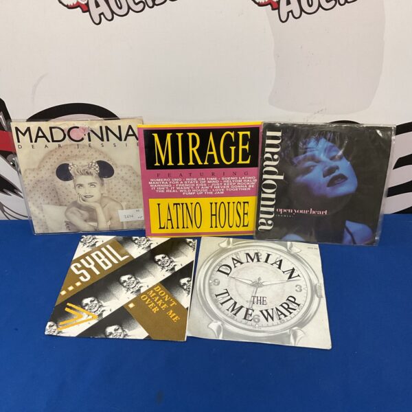 Lot of five 7” vinyl singles including Madonna records for collectors.