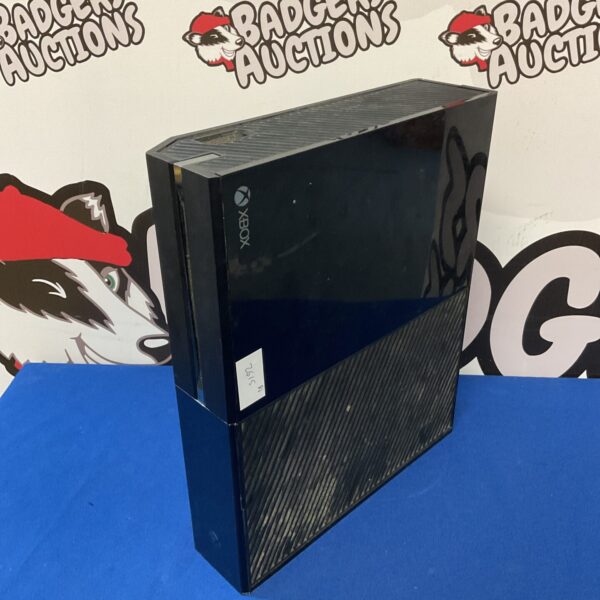 Black Microsoft Xbox One gaming console for sale.