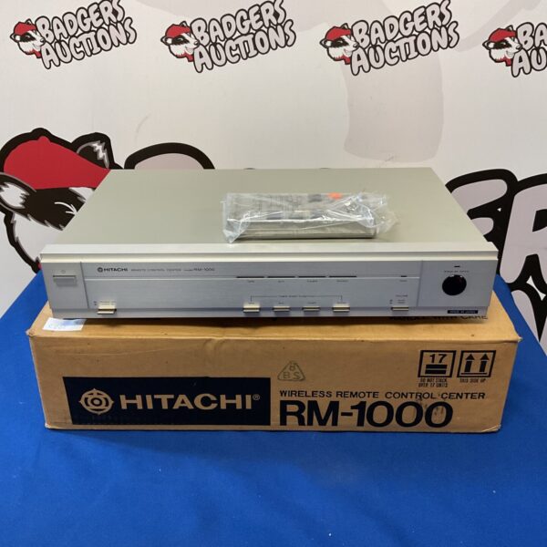Vintage Hitachi RM-1000 remote control center, black design.