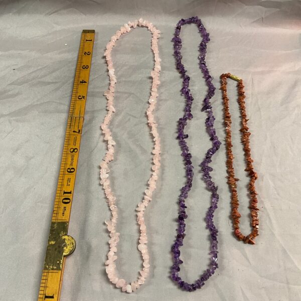 Elegant amethyst crystal necklace with faceted beads.