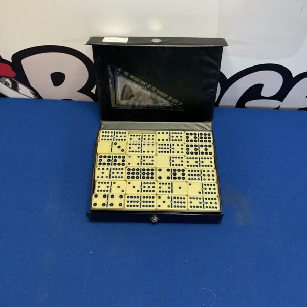 Vintage double 12 dominoes set in a wooden case.