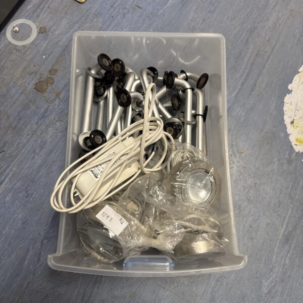 Lot of brushed steel door handles and Hera spotlights for restoration.