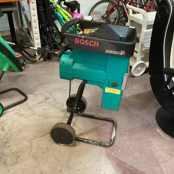 Used Bosch 2200 garden shredder with wheels for garden waste reduction.