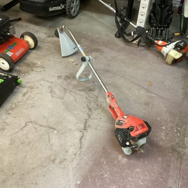Sovereign petrol garden strimmer for landscaping and garden maintenance.