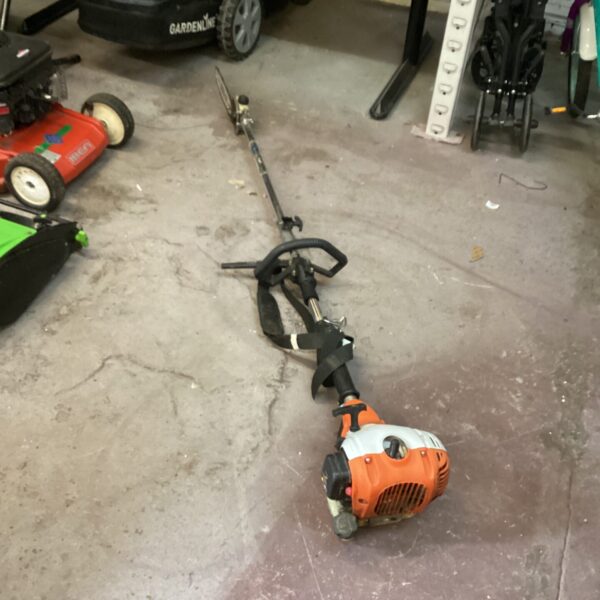 Used Eckman petrol garden multi tool with chainsaw attachment.