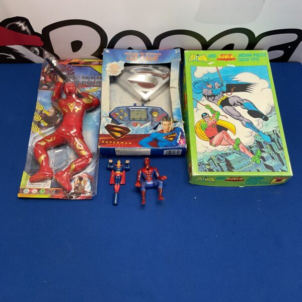 Mixed toy lot featuring Marvel and DC action figures and puzzle.