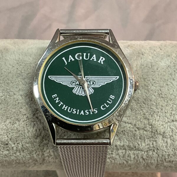 Vintage Jaguar Enthusiasts Club quartz wristwatch with silver bracelet.