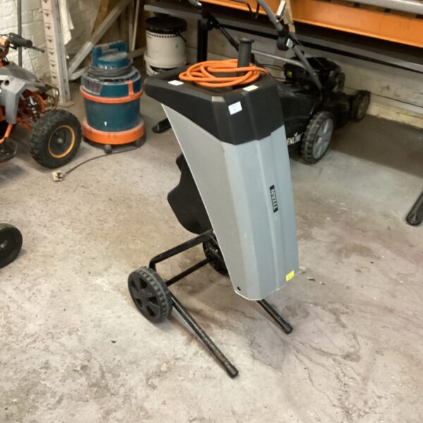 Electric Titan garden shredder for reducing garden waste.