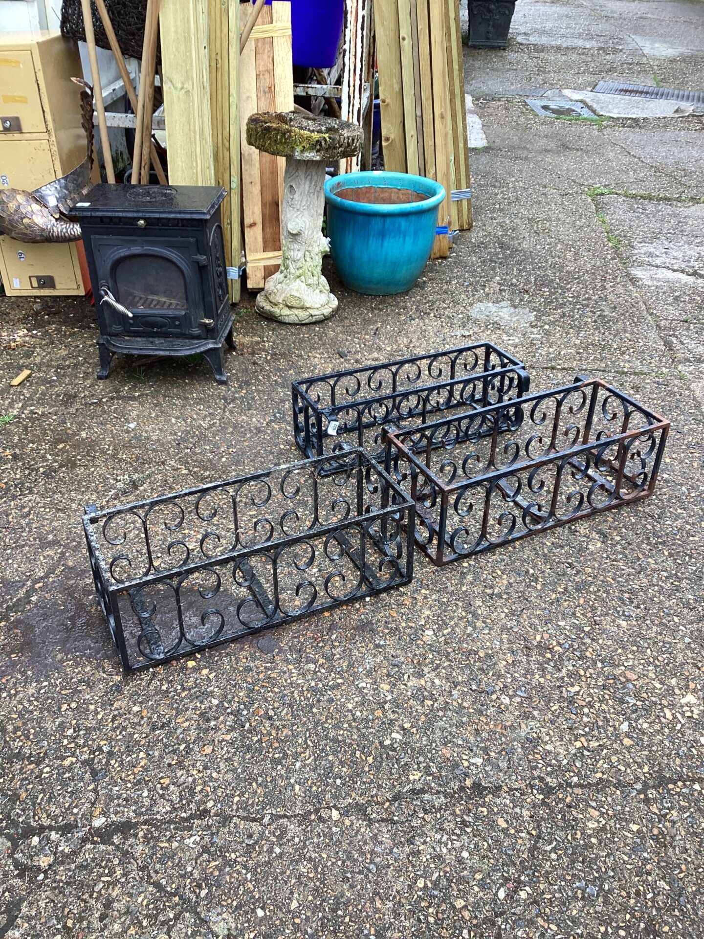 1022 Three wrought iron wall planters