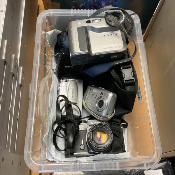 Vintage cameras lot including Olympus Trip and Sony Digital Mavica.