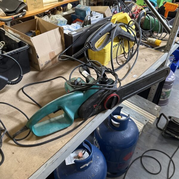 Bosch electric chainsaw for garden and DIY use, requiring attention.