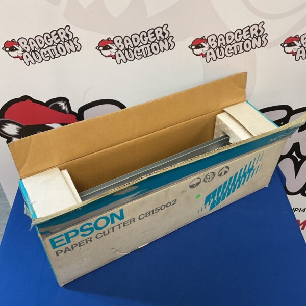 Vintage Epson C815002 paper cutter for office use.